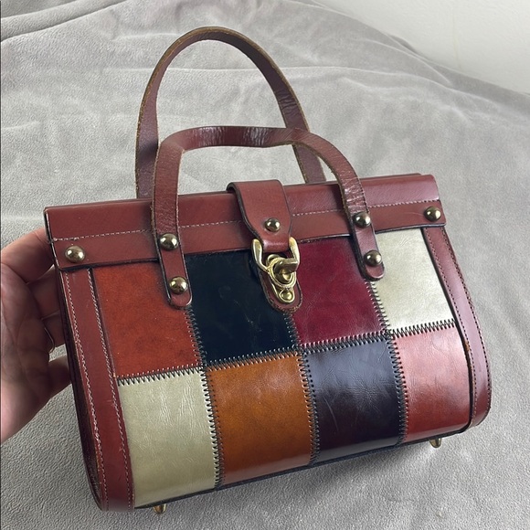 Vintage Brown Satchel with Structured Design and Metal Accents - Picture 2 of 15
